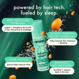 image of midnight mender overnight treatment in front of a dark green background with sea buckthorn berries and quinoa floating around the bottle. text: "powered by hair tech. fueled by sleep." "bond-fortifying technology: targets + strengthens the bonds in hair most prone to breakage" "cuticle strength repair technology: helps increase hair resistance + elasticity" "vegan protein: quinoa helps improve shine" "superfruit sea buckthorn: nourishes +restores lipids in the hair"