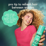 model holds midnight mender against a green background featuring a moon. text: "pro tip to refresh hair between washes: apply midnight mender on ends + perk up dry shampoo on roots to refresh + strengthen strands between wash days."