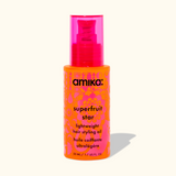 image of a pink and orange bottle with black lettering. amika superfruit star lightweight hair styling oil 50 ml / 1.7 US fl. oz. 